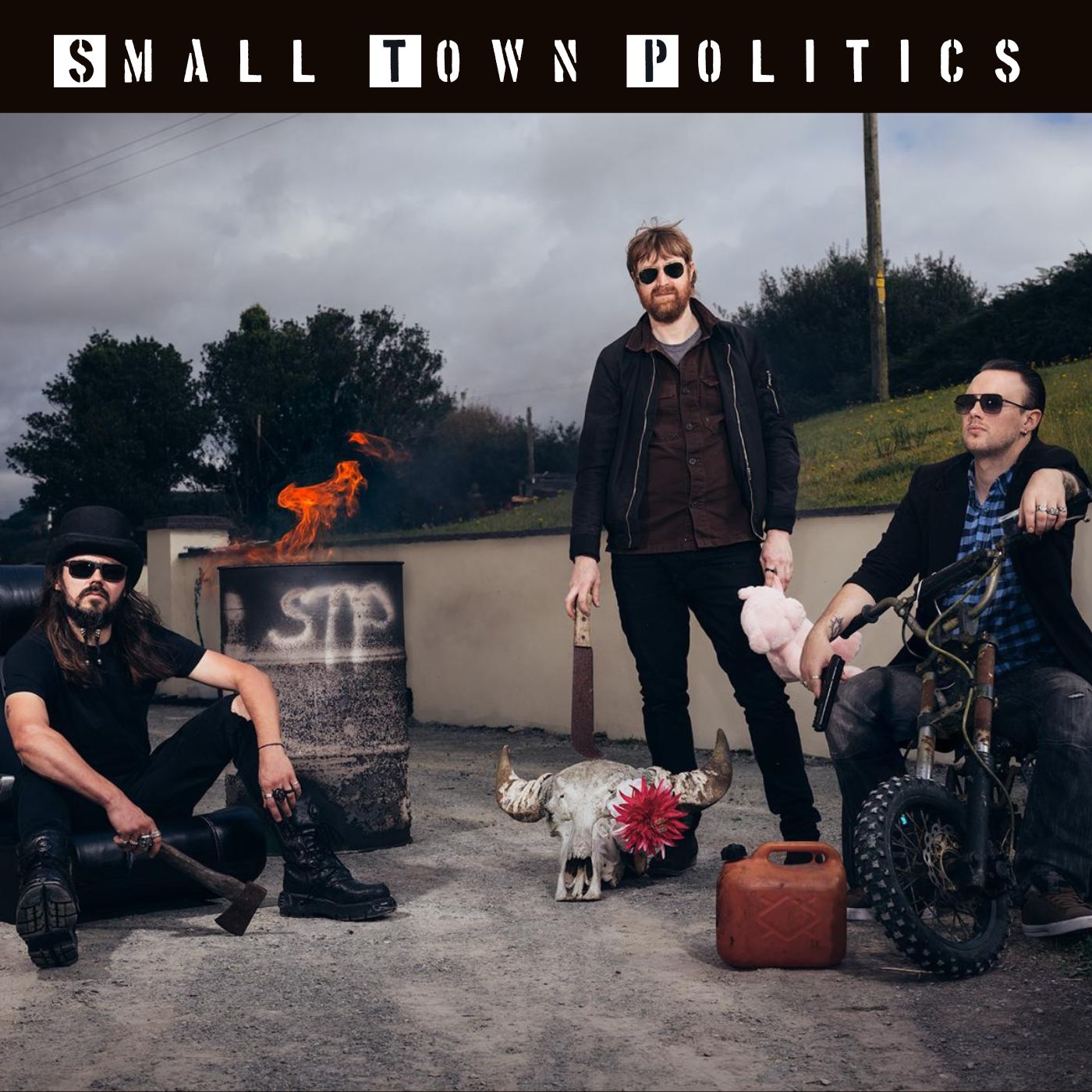 “The Devil Makes Work” by Small Town Politics Will Awaken The Rock Head Within You.
