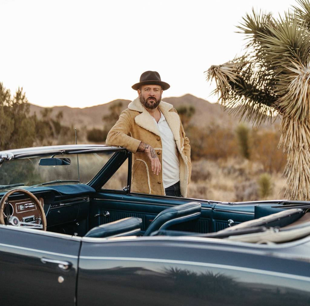 Man, Dessert, Car, Rolls, Royce, Jacket, Puffer, Hat, Cowboy, Fedora, Tattoos, Musician, Artist, Singer, Songwriter, Indie, Love, Highway, Brown, Mountains, Trees, Nature, Cloud