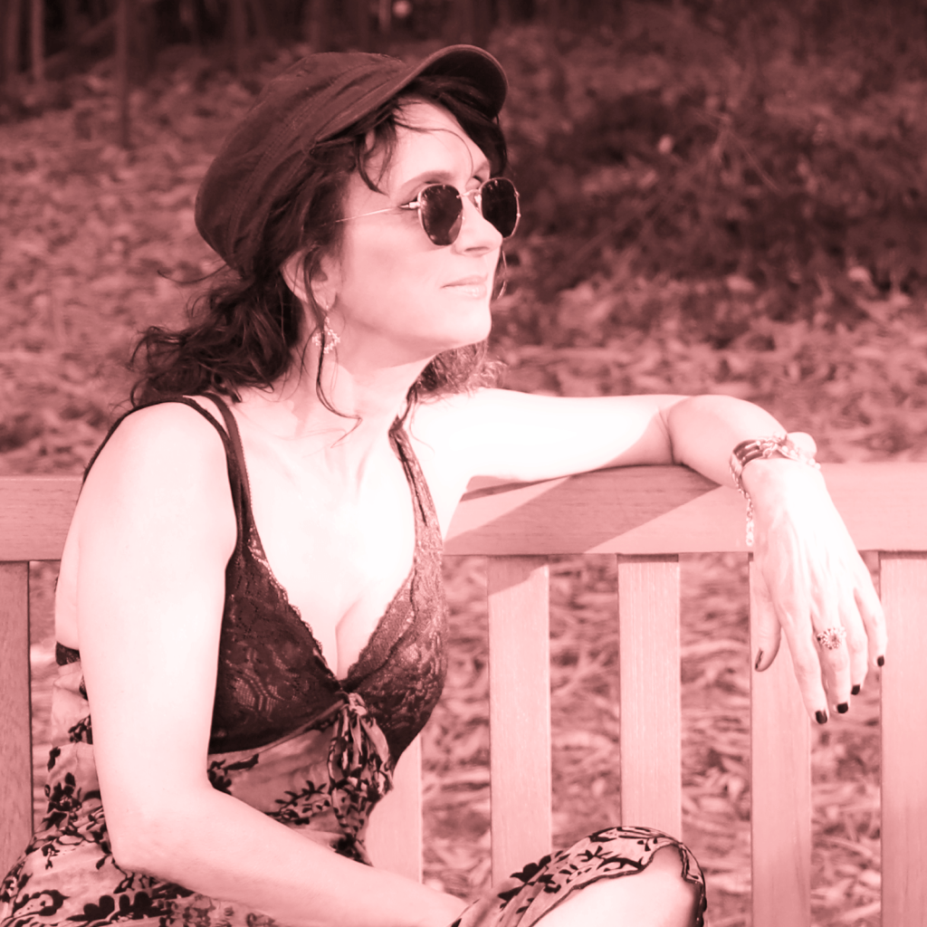 Woman, Shades, Sunglasses, Bench, Sepia, Cap, Dress, Sundress, Black, Grass, Ground, Garden, Park, Musician, Artist, Singer, Song, Music, Pop, Rock