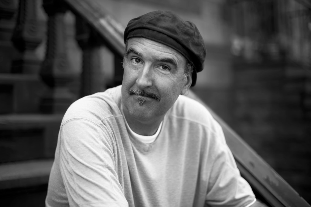 Man, Hat, Toupe, Beard, Moustache, Jumper, Sweater, Staircase, Monochrome, Veteran, Musician, Artist, Singer, Single, Song