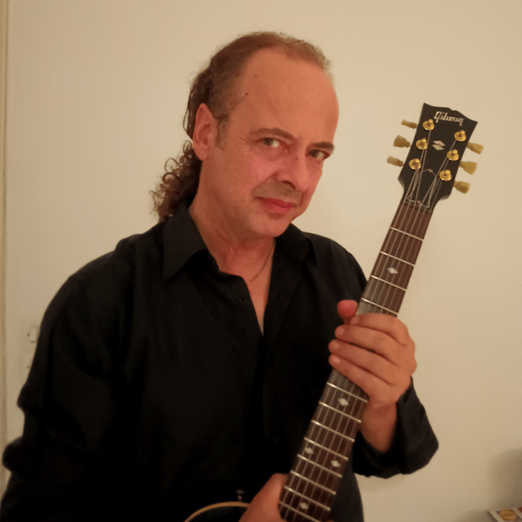 Man, Bossa Nova, Classical, Instrumental, Guitar, Acoustic, Strumming, Long hair, Shirt, Wall, House, Studio, Musician, Artist