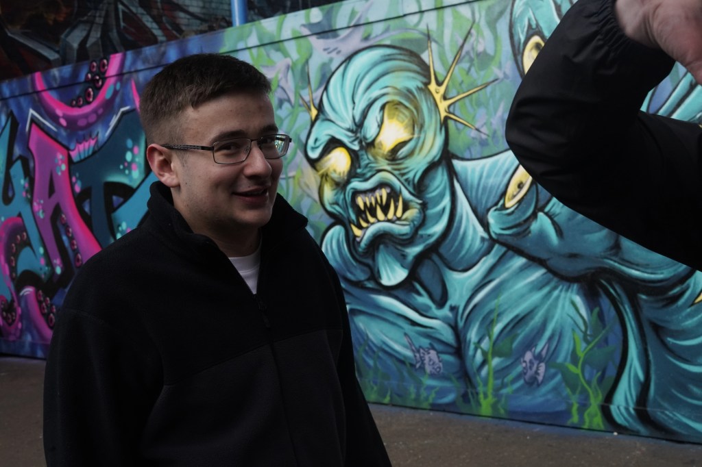 Man, Glasses, Graffiti, Art, Music, Musician, EDM, Green, Wall, Jacket, Jumper, Tshirt